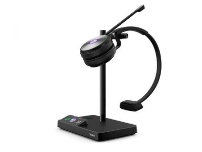 A headset sitting on a stand.